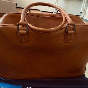 Dooney & Bourke FlorentineVachetta Leather Bowling Duffle 


12H x8w x21.5L